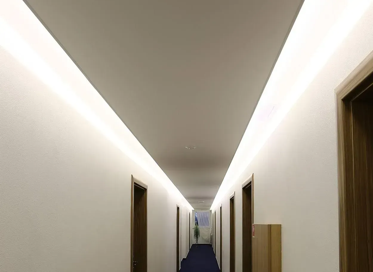 Hotel hallway lighted by MASTER LONGRUN LED strip